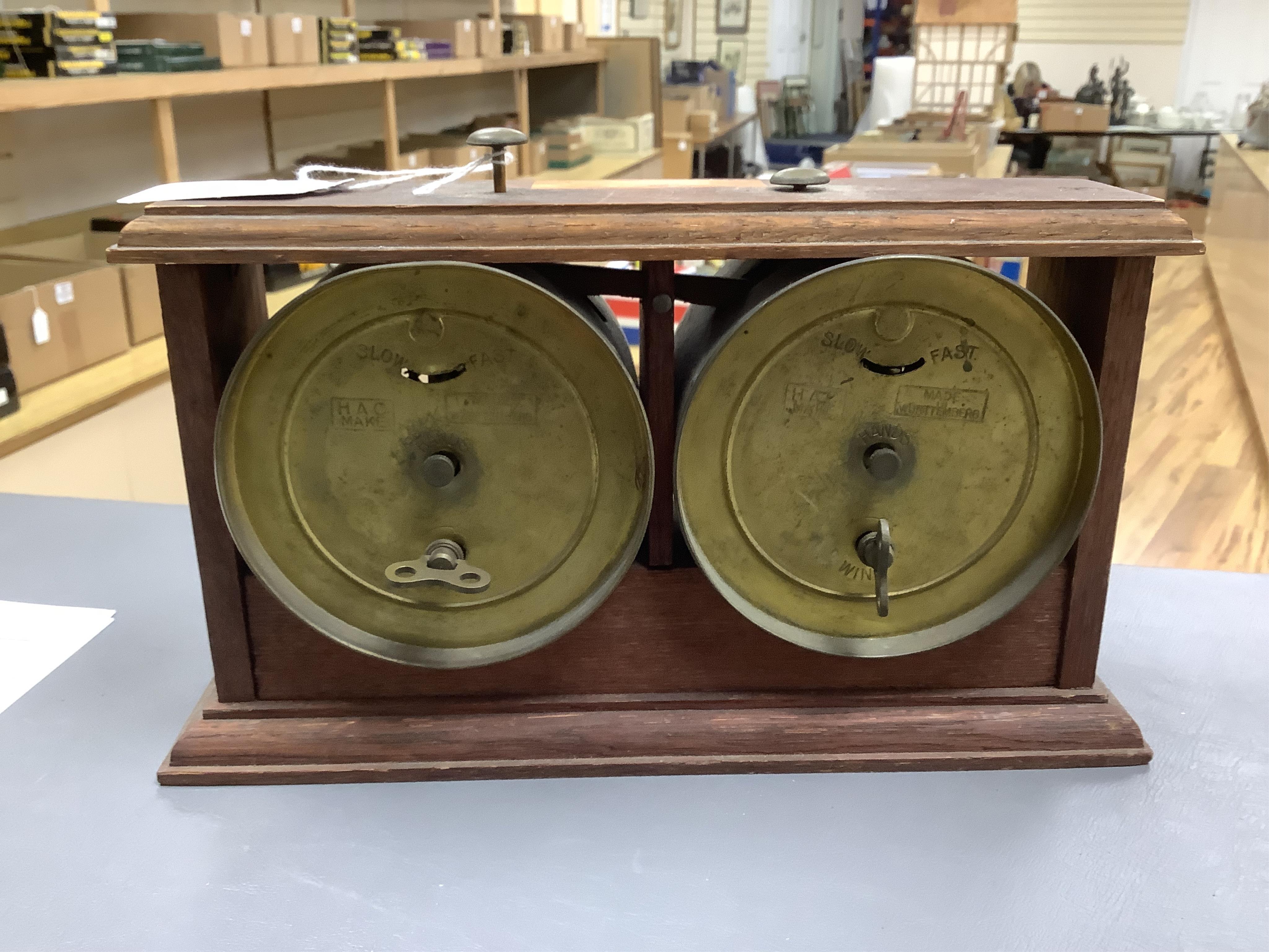 A William Tanner 'The Reliable Chess Timer' in an oak case, stamped to the reverse ‘HAO Make, Made in Wurttemberg’. Condition - fair to good.